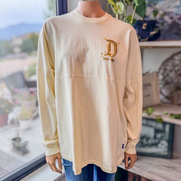 Disneyland Resort Pixie Dust Cream/Gold Spirit Jersey w/ Gold Foil Logo, Large - Picture 2 of 10